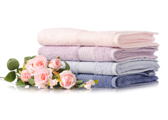 Fototapeta na wymiar A stack set of towels pink blue flowers