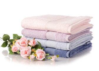 Fototapeta na wymiar A stack set of towels pink blue flowers
