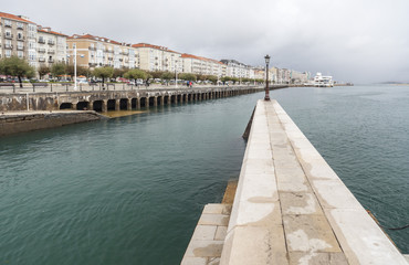 Promenade maritime and jetty in bay of Santander , Cantabria, Spain.