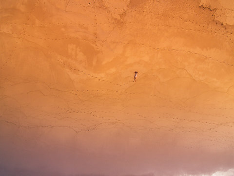 Aerial view of woman on the beach