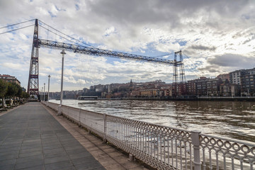 Nervion river, promenade and Vizcaya bridge, puente colgante, view from Getxo,Basque Country,Spain.