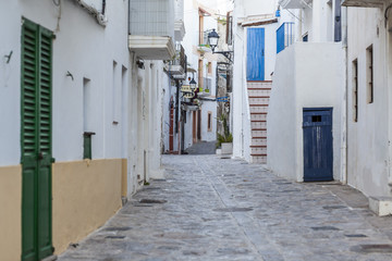 Fototapeta na wymiar Street view, historic center, houses in walled enclosure of the old town.Ibiza,Spain.