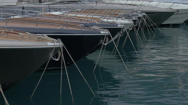Row of boats anchored in a port