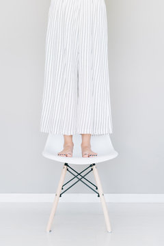 Woman spend time on a chair