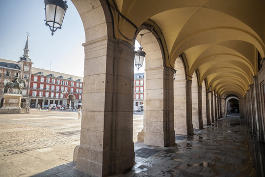 Arches and square, plaza mayor, iconic area, touristic point in historic center of Madrid.Spain.
