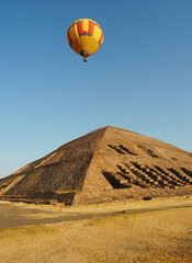 Fototapeta na wymiar Sun Pyramid and Hot Air Balloon 