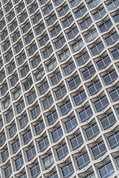 Facade of modern high rise building with windows