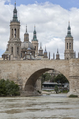 Fototapeta na wymiar Zaragoza, monument, El Pilar, stone bridge and Ebro river.Spain.