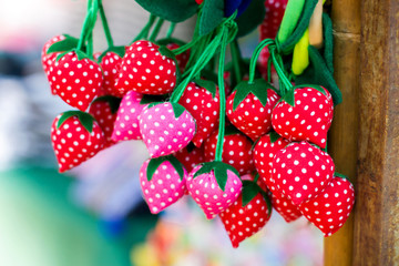Colorful rubber band hair made from fabric red color and white dot pattern. Design like Strawberry Fruit.