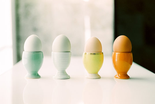 eggs in pastel egg holders
