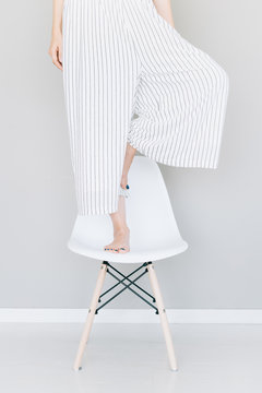 Woman spend time on a chair