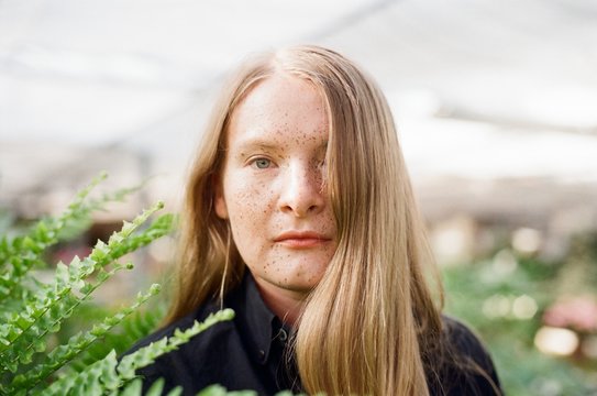 A beautiful blond woman with freckles