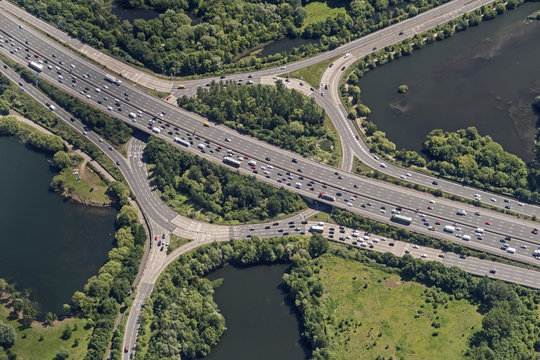 Circular motorway intersection in England seen from an airplane