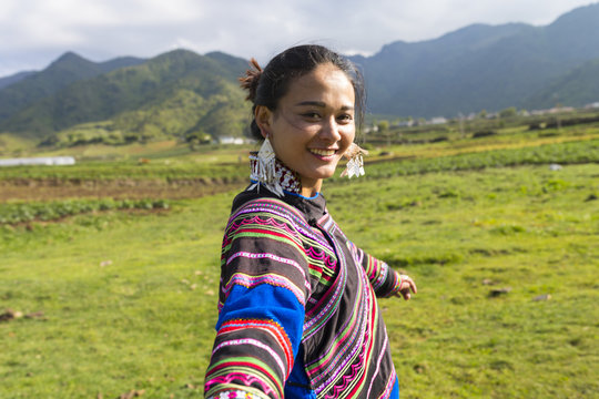 Beautiful Chinese Yi people in traditional costumes  outdoor