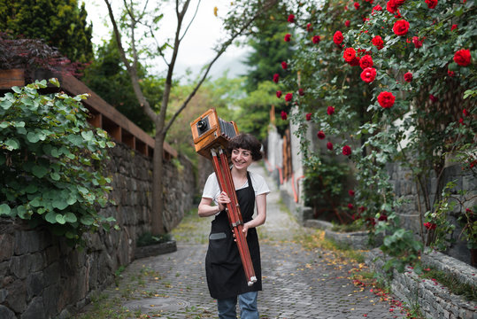 young woman shooting with large format camera