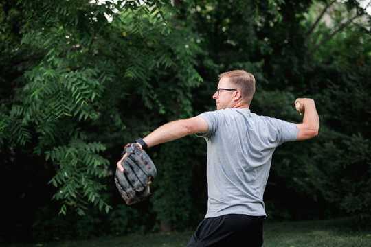 Man throwing a baseball