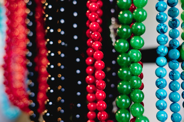 Array of colorful beads. Selective focus. Landscape orientation.