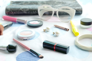 Fashion stylish cosmetics, makeup accessories woman colorful background .