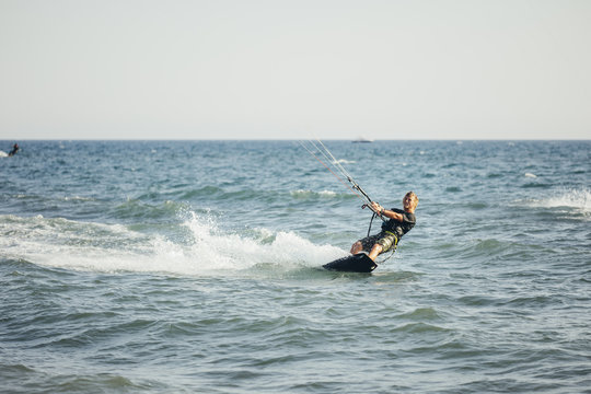 Mand Kite-surfing on the Sea