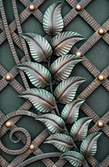 forged leaves on the gate