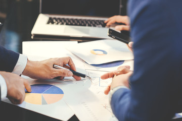 Business man working at office with laptop and documents,businessmen using documents at meeting,Teamwork Togetherness Unity Variation Support Concept,Business team 