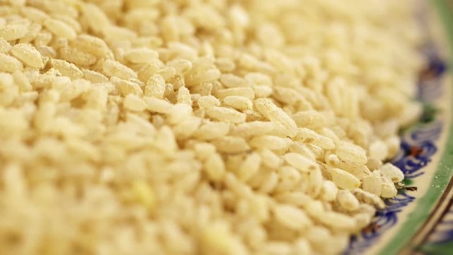 White dry rice close up. Polished white rice. close up. semi-indistinct shot