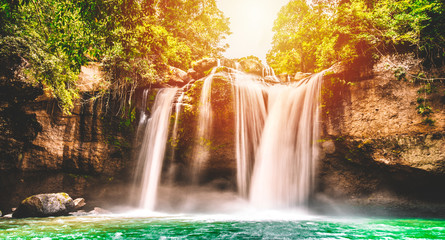 Waterfall in tropical forest Thailand,leaf moving low speed shutter blur,Deep forest, Thailand,Motion blur of water 