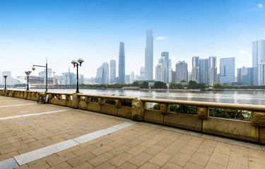 Panoramic skyline and buildings with empty concrete square floor in guangzhou,china