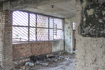 Fototapeta na wymiar Abandoned building. Ruins of the river port in one of the cities in Eastern Europe.
