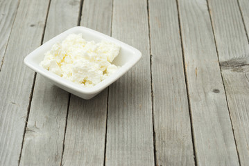 dairy products, rustic wooden table background