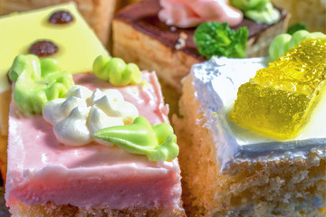 Assorted colorful natural sweet cakes. Concept of tasty cakes. Food background.