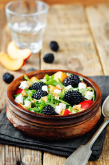 Arugula peach blackberry goat cheese salad