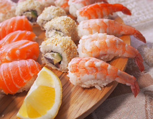 Philadelphia roll sushi with salmon, smoked eel, cucumber, avocado, cream cheese, red caviar. Sushi menu. Japanese food. Healthy food
