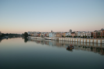 Sunrise in Seville, on the Guadalquivir river, in Spain