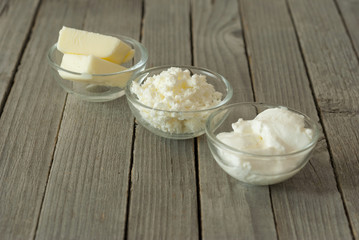dairy products, rustic wooden table background