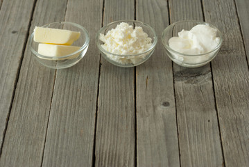 dairy products, rustic wooden table background