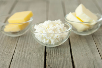 dairy products, rustic wooden table background