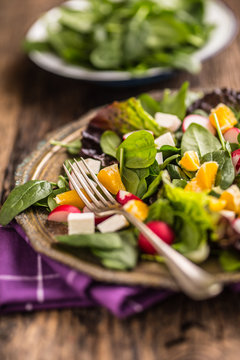 Spinach Salad. Fresh spinach salad with fruit and vegetable
