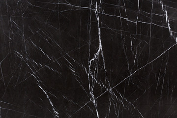 Fototapeta na wymiar Strict natural marble background in stylish dark tone.