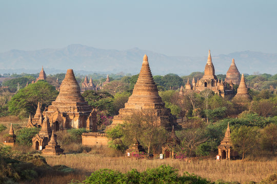 Many temples, pagodas and stupas at the ancient plain of Bagan viewed from the Shwesandaw Temple in Myanmar (Burma), in the morning.