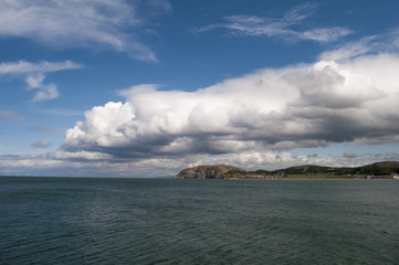 Fototapeta na wymiar Coastline with blue sky and clouds