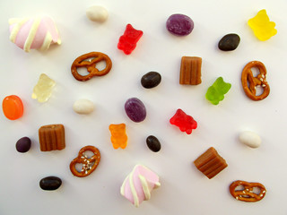 Unhealthy food concept. A lot of sweets and candies background. Close up. Toning effect	