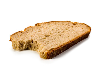 Slice of bread bitten on white background