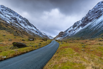 Honister Pass with its snow capped mountains, Cumbria, England