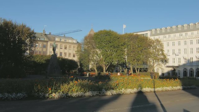 Reykjavik, Iceland - SEP, 2016: square in from of building of parliament with flowerbeds, building