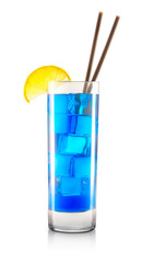 Blue curacao cocktail in classical glass with slice of lemon and tube isolated on white background with clipping path