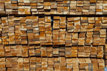 Stack of teak wood in lumber yard. pile Wooden