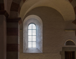 Fototapeta premium The old and ancient window in dark room