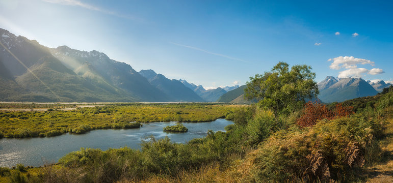 Glenorchy Lagoon panoramic view with the mountain range towards Mount Aspiring National Park in the background in New Zealand