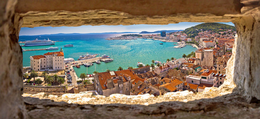 Split waterfront aerial panoramic view through stone window - obrazy, fototapety, plakaty